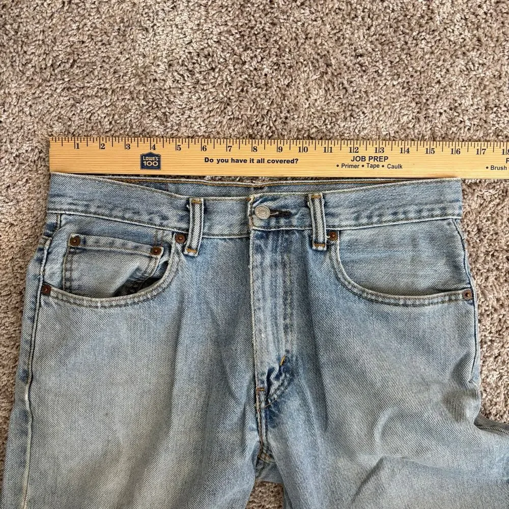 Vintage Y2K Levis 550 Relaxed Fit Light Wash Faded Distressed Jeans 32x32 Baggy